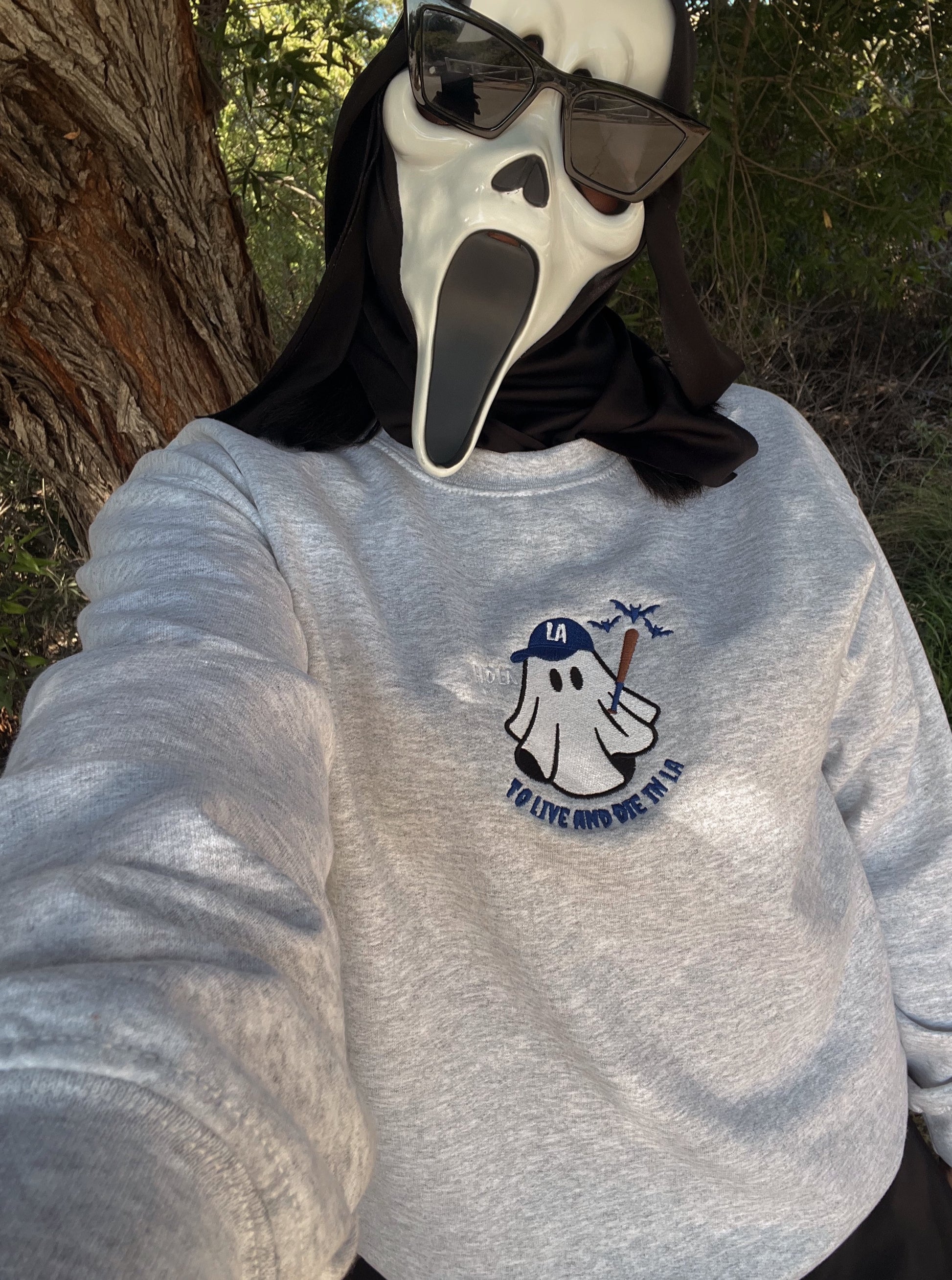 Fully embroidered design. To live and die in LA in Dodger Blue. ghost design with Dodger Blue LA cap, brown bat with dodger blue bats, HDLA in white.
